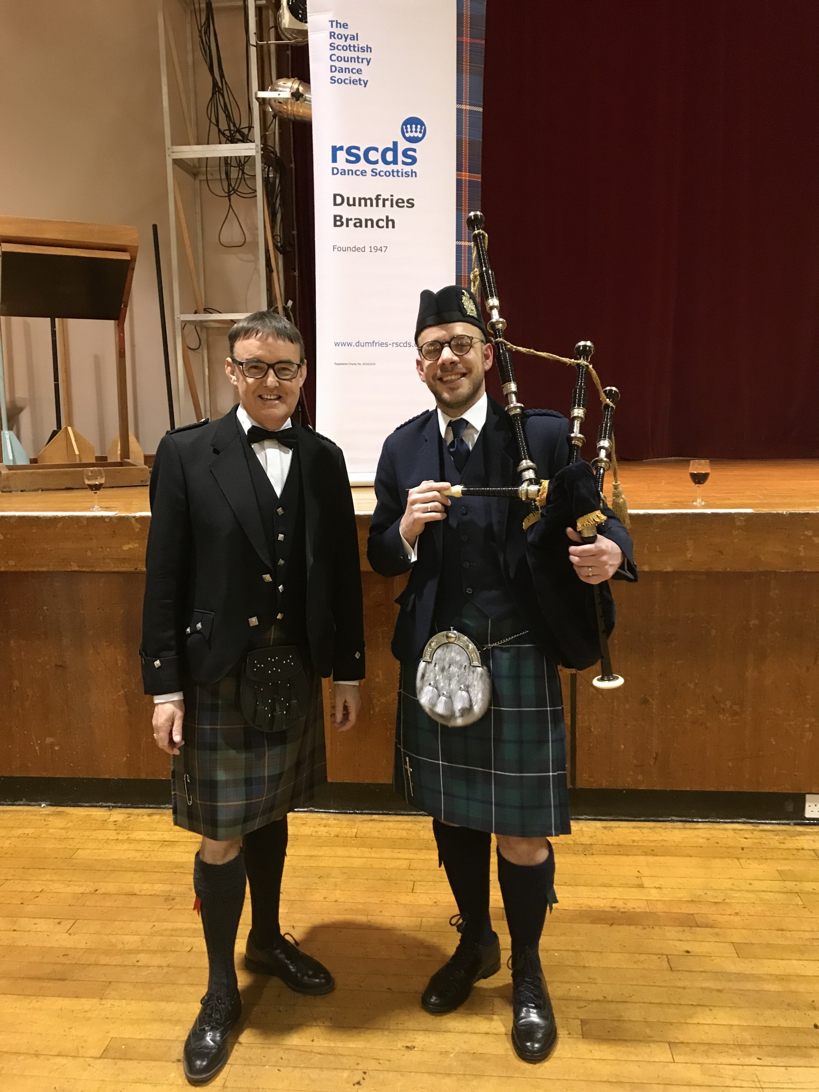 Dumfries Branch Chairman William Williamson and piper Gavin Maxwell